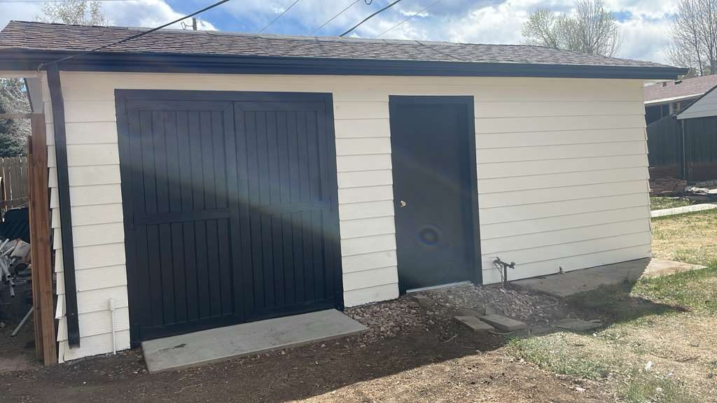 After: Denver metro · Garage barn doors · Cream to white and black