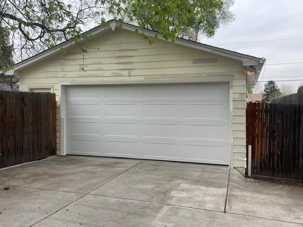 Before: Denver metro · Detached garage repaint · White with glossy black door