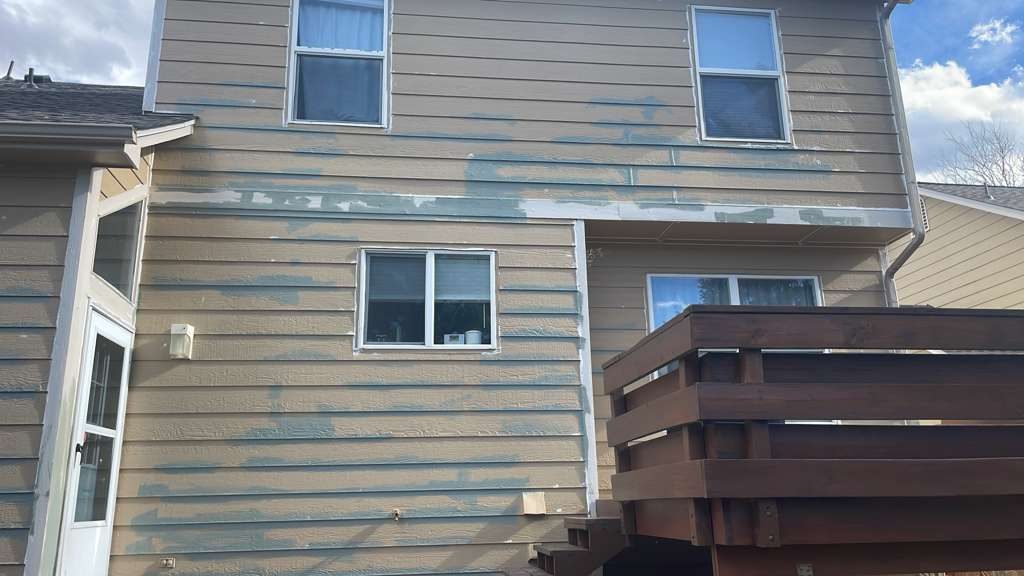 Before: Denver metro · Two-story exterior repaint · Fresh gray, white trim